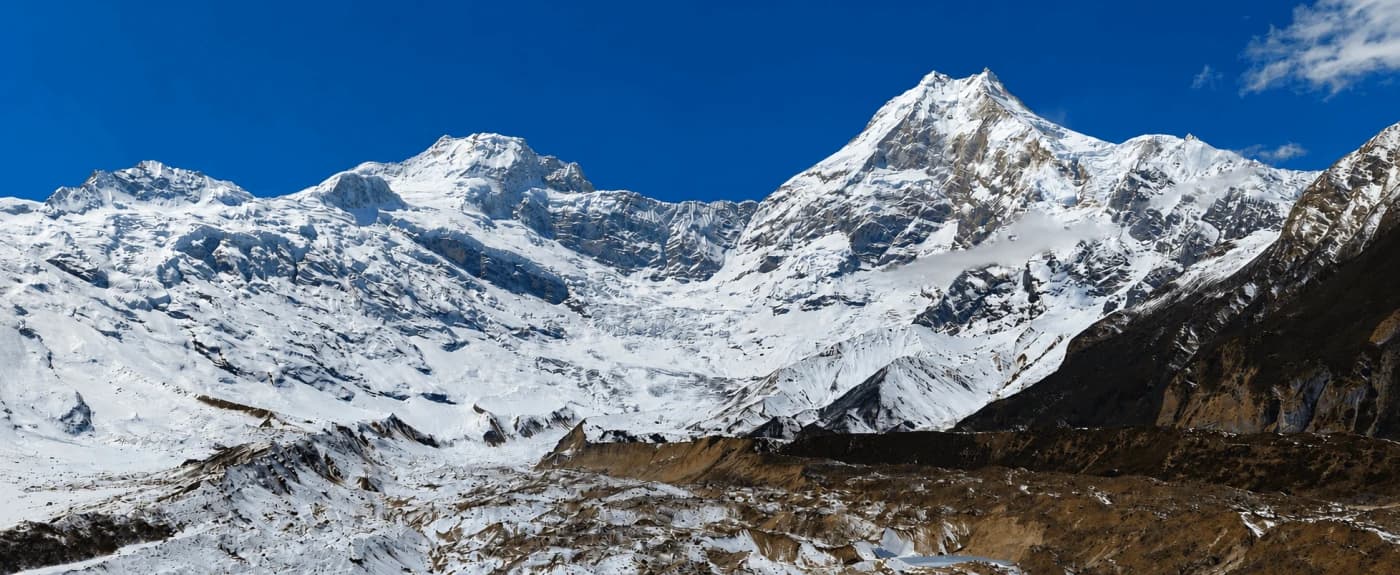 Panoramic view of Mount Manaslu along the Manaslu Circuit Trek in Nepal with Thrill Himalaya Treks.